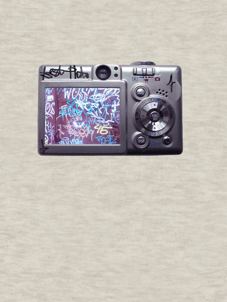 Tagged digicam with graffiti photo by farida_shadd