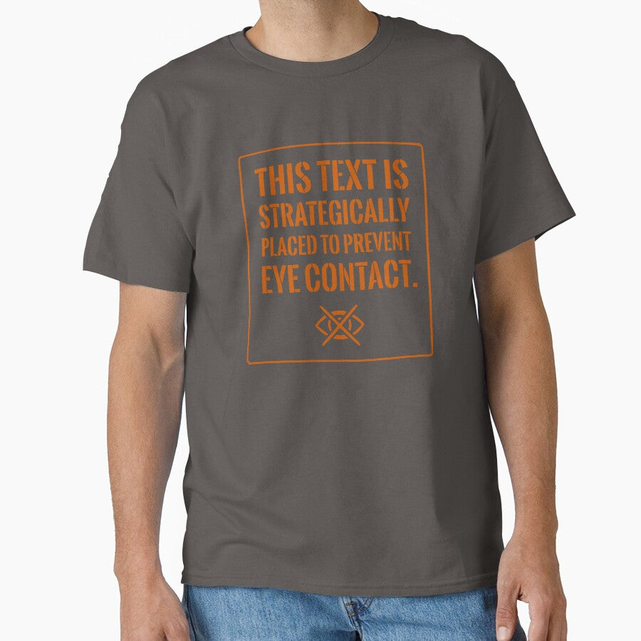 Funny Introvert Shirt: Strategically Placed To Prevent Eye Contact (Orange Text) by RetroNeon