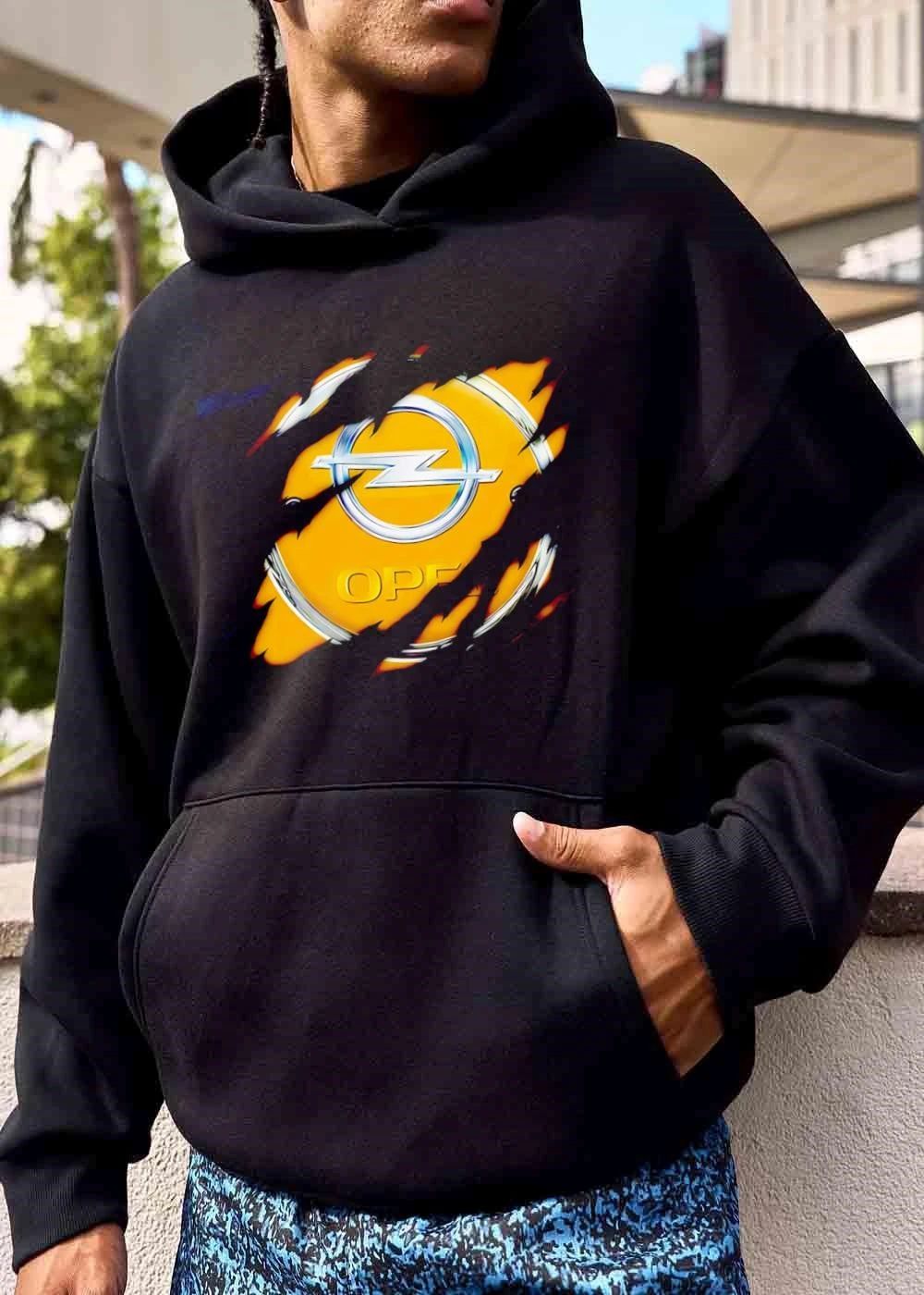 Opel Metallic Logo Silver Lightning Bolt Ripped Torn Surface Yellow Background shirt