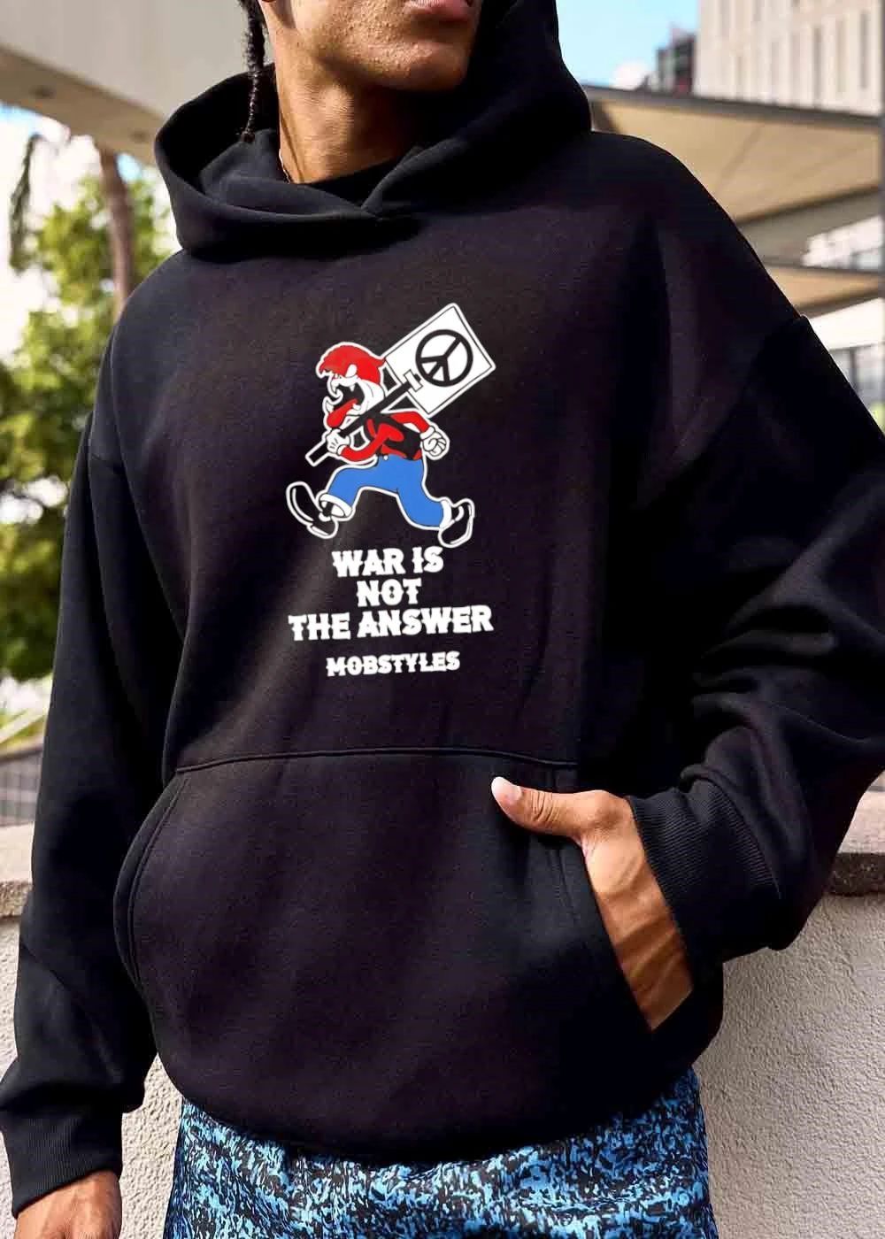 Mobstyles War Is Not The Answer Cartoon Creature Carrying Peace Sign Board shirt