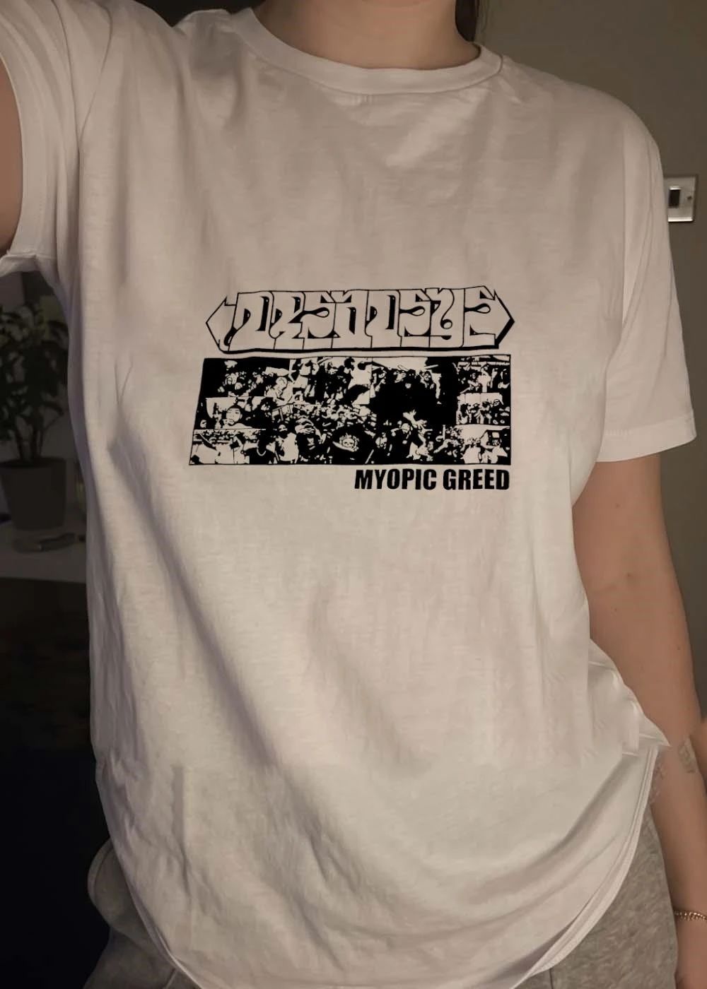 Myopic Greed Dmsseye Collage Black and White Graphic T-Shirt
