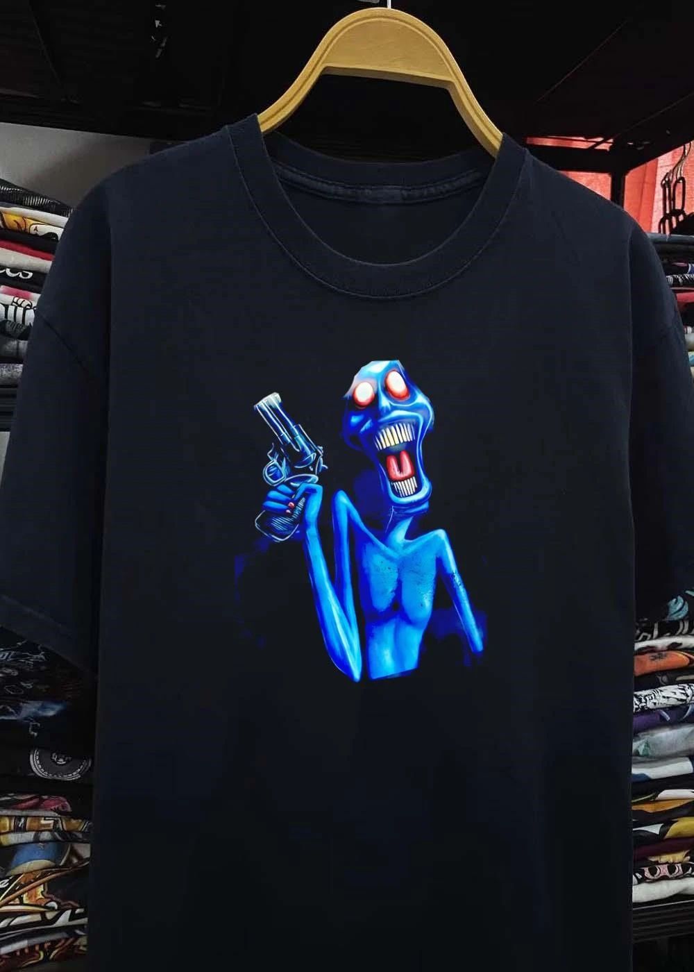 Blue Monster Holding Revolver Gun shirt