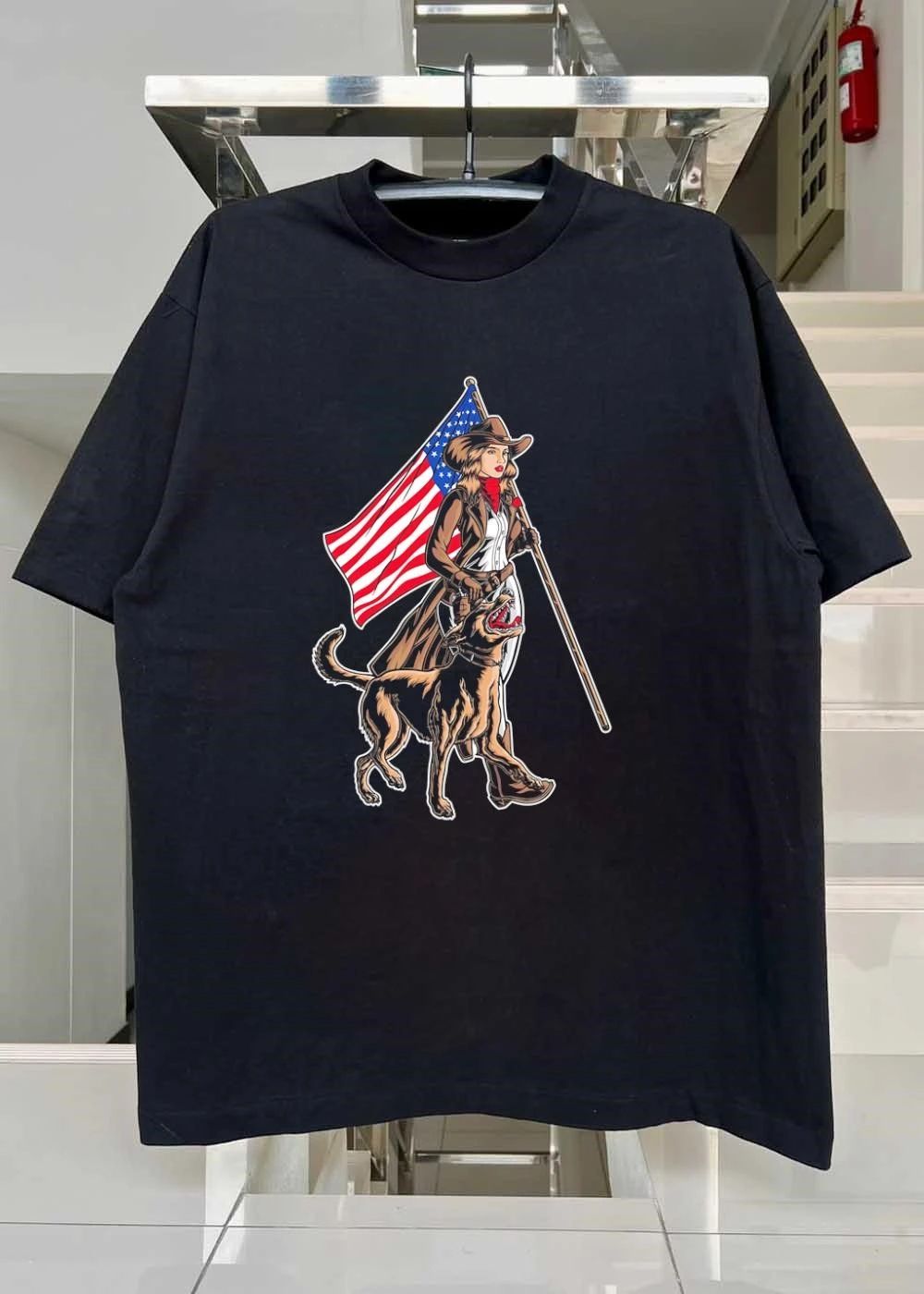 Patriotic Cowgirl and Loyal K9 Guardian Walking with the American Flag T-Shirt