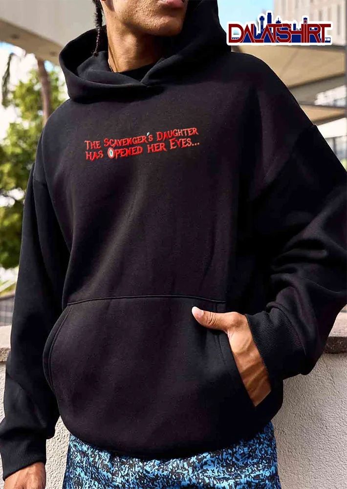 The Scavengers Daughter Has Opened Her Eyes Spiky Red Lettering Cyan Pupil Accents shirt